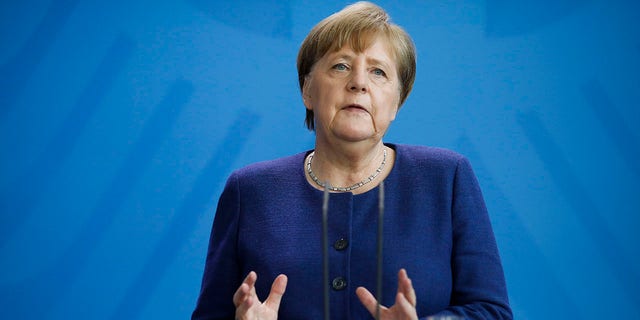 Merkel briefed the media about measures the German government is taking to avoid further spread of the coronavirus at the chancellery in Berlin on Monday. (AP Photo/Markus Schreiber, Pool)