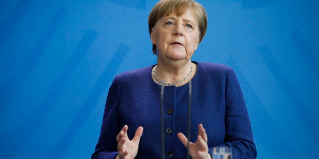 Merkel briefed the media about measures the German government is taking to avoid further spread of the coronavirus at the chancellery in Berlin on Monday. (AP Photo/Markus Schreiber, Pool)