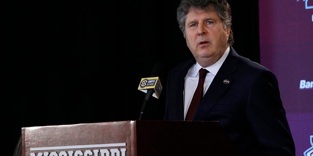 FILE - In this Jan. 10, 2020, file photo, new Mississippi State football coach Mike Leach, speaks before reporters and school supporters at the university in Starkville, Miss., after being officially introduced as the head coach. Leach apologized Thursday, April 2, 2020, for a tweet that displayed a meme of a woman knitting her husband a noose as they were self-quarantined. Leach removed the tweet, which was posted Wednesday night. He posted on Twitter that he didn’t mean to offend anyone. (AP Photo/Rogelio V. Solis, File)