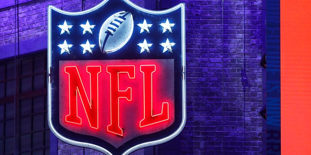 Detailed view of the NFL shield logo in neon lights during the first round of the NFL Draft on April 25, 2019 in Nashville, Tennessee.