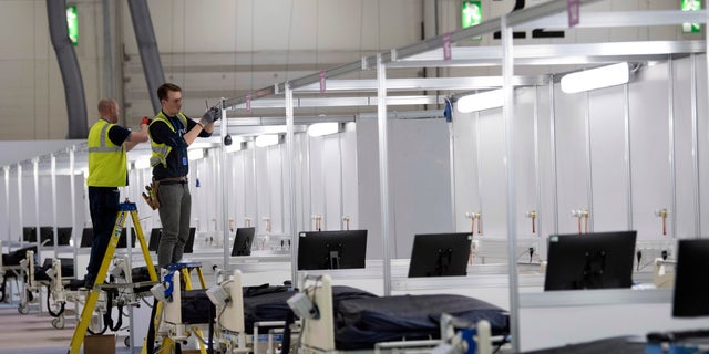 The NHS Nightingale hospital in London will eventually have enough beds to treat up to 4,000 coronavirus-positive patients. (AP)