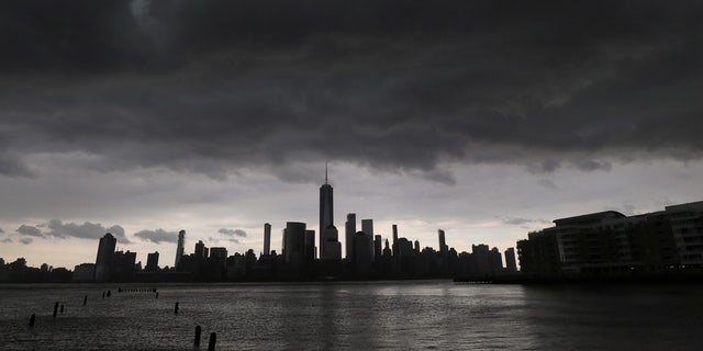 A thunderstorm passes over lower Manhattan and One World Trade Center in New York City, April 21, 2020. A "gustnado" was reported in Northern Manhattan from the storms.