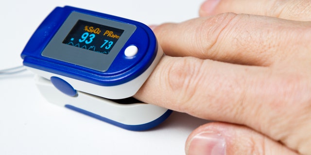 A pulse oximeter is a non-invasive way to monitor oxygen saturation in a person's blood.