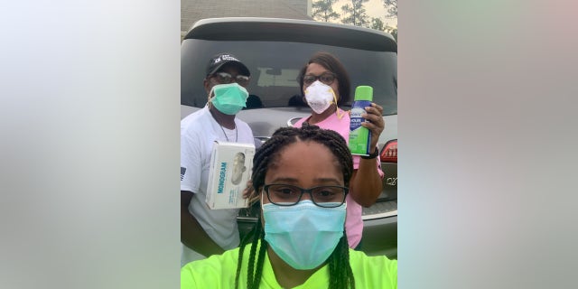 Community Warriors volunteers Carman Moss (center), Hellen Smoaks (left) and Lucy Collier (right).
