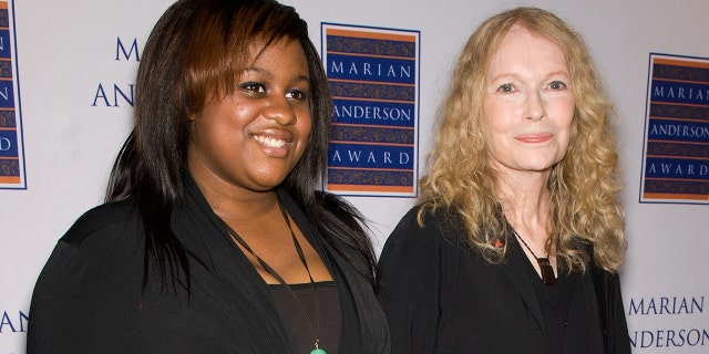 Mia Farrow (R) and daughter Quincy Farrow attend the 2011 Marian Anderson award gala honoring Mia Farrow at the Kimmel Center for the Performing Arts on May 10, 2011.