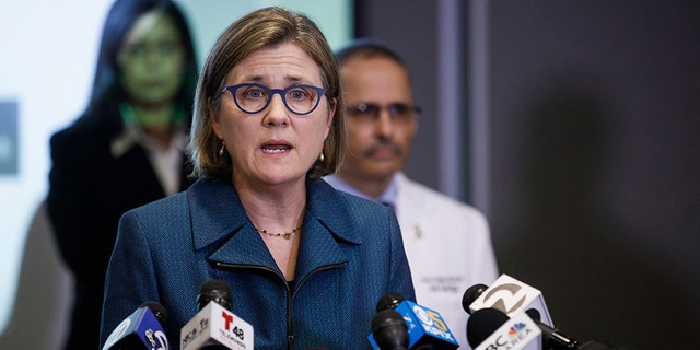 FILE - In this March 16, 2020 photo, Dr. Sara Cody, Santa Clara County Public Health Officer, speaks during a press conference headed by public health directors spanning six Bay Area counties in San Jose, Calif. On the morning of March 15, as Italy became the epicenter of the global coronavirus pandemic, a half dozen high-ranking California health officials held an emergency conference call to discuss a united effort to contain the spread of the virus in the San Francisco Bay Area. That call and the bold decisions that came in the hours afterward have helped California avoid the kind of devastation from the virus in parts of Europe and New York City. (Dai Sugano/Bay Area News Group via AP, File)