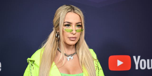 Tana Mongeau reportedly lost her verification on her YouTube channel temporarily after offering to send fans nude photos if they could provide proof that they voted for Joe Biden. It is unclear if the two events are connected. (Photo by Morgan Lieberman/FilmMagic)