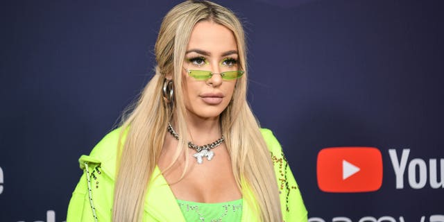 Tana Mongeau reportedly lost her verification on her YouTube channel temporarily after offering to send fans nude photos if they could provide proof that they voted for Joe Biden. It is unclear if the two events are connected. (Photo by Morgan Lieberman/FilmMagic)