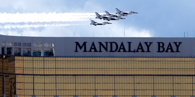 The U.S. Air Force Air flight demonstration squadron, the Thunderbirds, flies by the Mandalay Bay hotel-casino as they show their support for frontline COVID-19 health care workers and first responders in Las Vegas, Saturday, April 11, 2020.