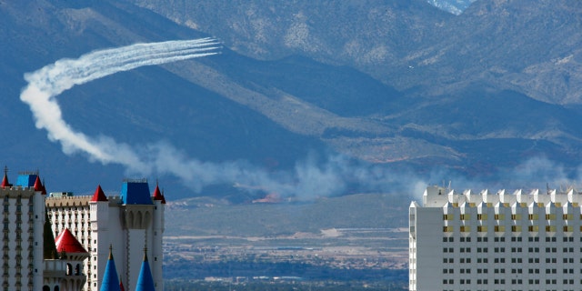 The U.S. Air Force Air flight demonstration squadron, the Thunderbirds, show their support for frontline COVID-19 healthcare workers and first responders with a flyover in Las Vegas, Saturday, April 11, 2020.