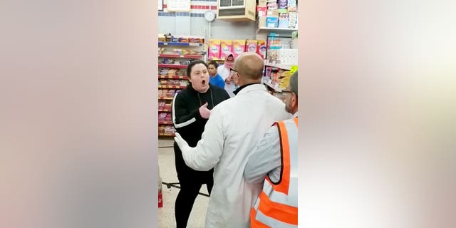 The woman reportedly become upset when a “male customer was standing in her way, talking to another person."
