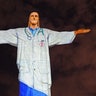 The Christ the Redeemer statue is lit up with a doctor's uniform projected on it in honor of all the medical staff fighting the COVID-9 coronavirus pandemic worldwide in Rio de Janeiro, Brazil on April 12, 2020.
