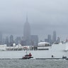 The USNS Comfort hospital ship sails in the Hudson River past the Empire State Building as it departs New York City, April 30, 2020. 