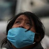 Aurora Guadalupe Azamar reacts after learning that her mother died of COVID-19 disease, outside of a public hospital at Iztapalapa, Mexico City, April 29, 2020. 