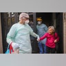 Medical staff evacuates an elderly woman from a nursing home after multiple residents of the facility tested positive for the coronavirus, in Buenos Aires, Argentina, April 22, 2020.