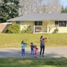 This mom with her 3 daughters walked through the neighborhood serenading anyone outside on April 7th 2020. Renton Washington What a joy! They played for me Old Joe Clark.