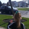 Five year old Ruby watching a car parade of teachers from her school honking &amp; waving! Grandpa Tut