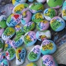 Love Rocks is the theme painted on hundreds of rocks painted with the messages "Love Rocks" and "U R Loved" on one face of the pastel egg-shaped stones. The reverse side reads "John 3:16". As we walk, masked and social distant compliant, my grandchildren, sister and daughter are tossing the imitation Easter eggs onto neighbors yards sharing an encouragement and timely Bible message for all who want to pursue the message. So far, all thumbs up!