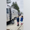 I am a cancer survivor and my husband is a doctor in Spokane Washington. He now lives in our airstream in the driveway. This is a photo from our girls taking him pancakes after a call shift. It’s the only way they see their daddy in person these days. We miss him!