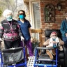 Residents and caregivers catch some rays of Spring sunshine on the patio. Trying out some new handmade face masks donated by friends and family. Monarch Greens Residential Assisted Living Home - 4.5.20, Fort Collins, CO Erin Ellis Monarch Greens Assisted Living A Home For Life