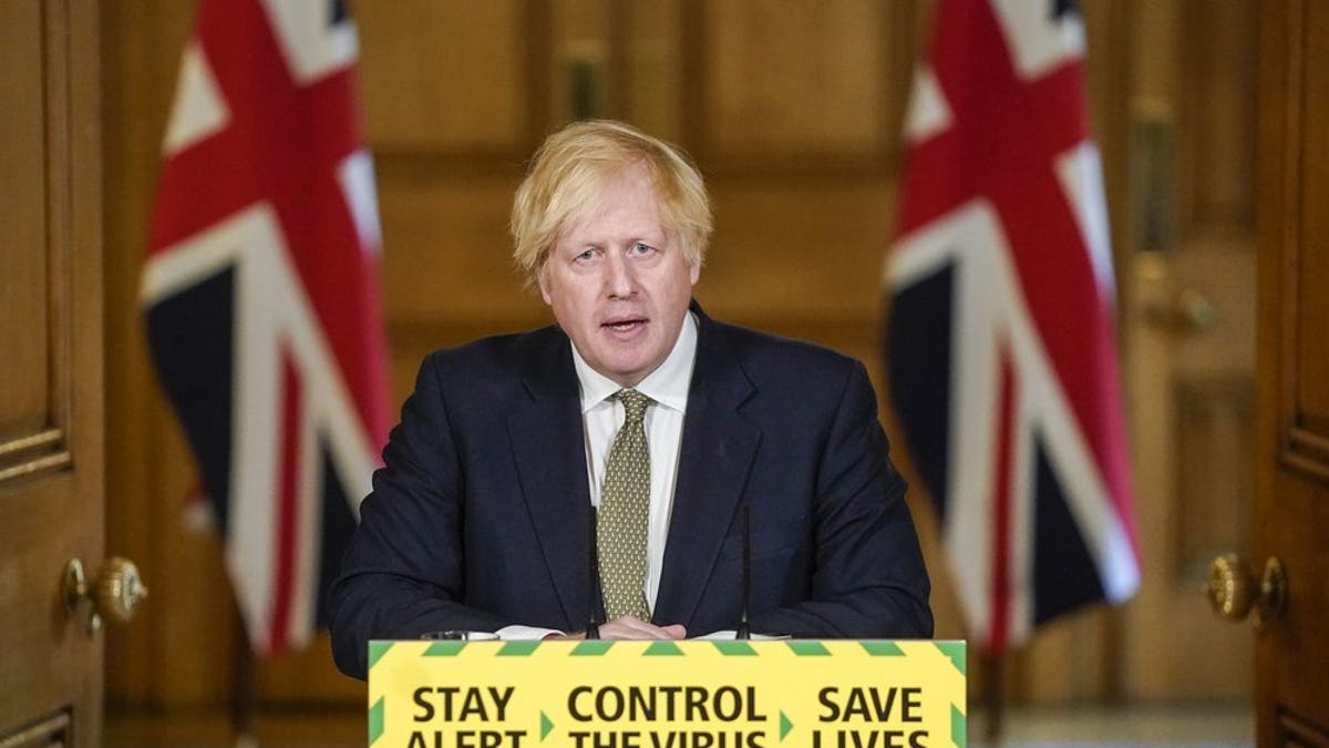 Britain's Prime Minister Boris Johnson speaking during a briefing on the coronavirus in London on Sunday. (Andrew Parsons/10 Downing Street via AP)