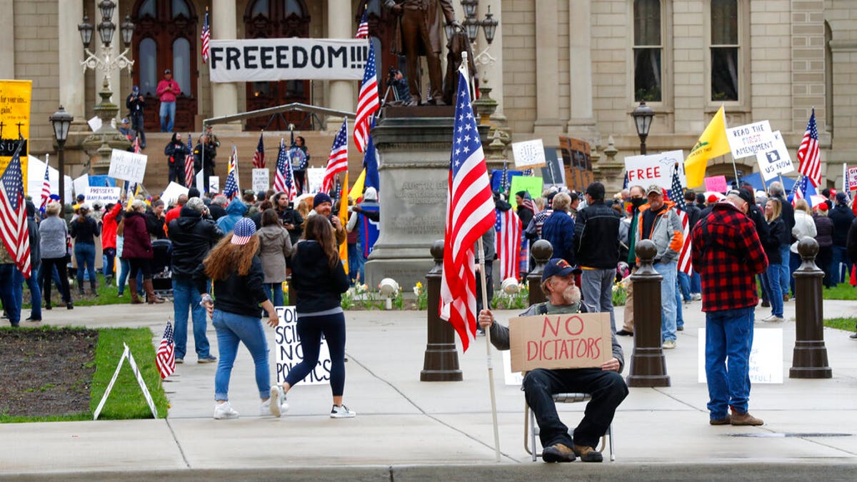 Protesters rally at the State Capitol in Lansing, Mich. 