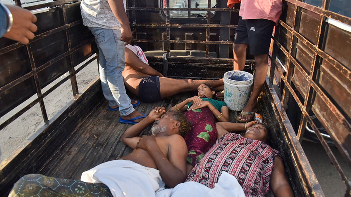 People affected by a chemical gas leak are carried in a truck for medical treatment in Vishakhapatnam, India, Thursday, May 7, 2020. Chemical gas leaked from an industrial plant in southern India early Thursday, leaving people struggling to breathe and collapsing in the streets as they tried to flee. Administrator Vinay Chand said several people fainted on the road and were rushed to a hospital. (AP Photo)