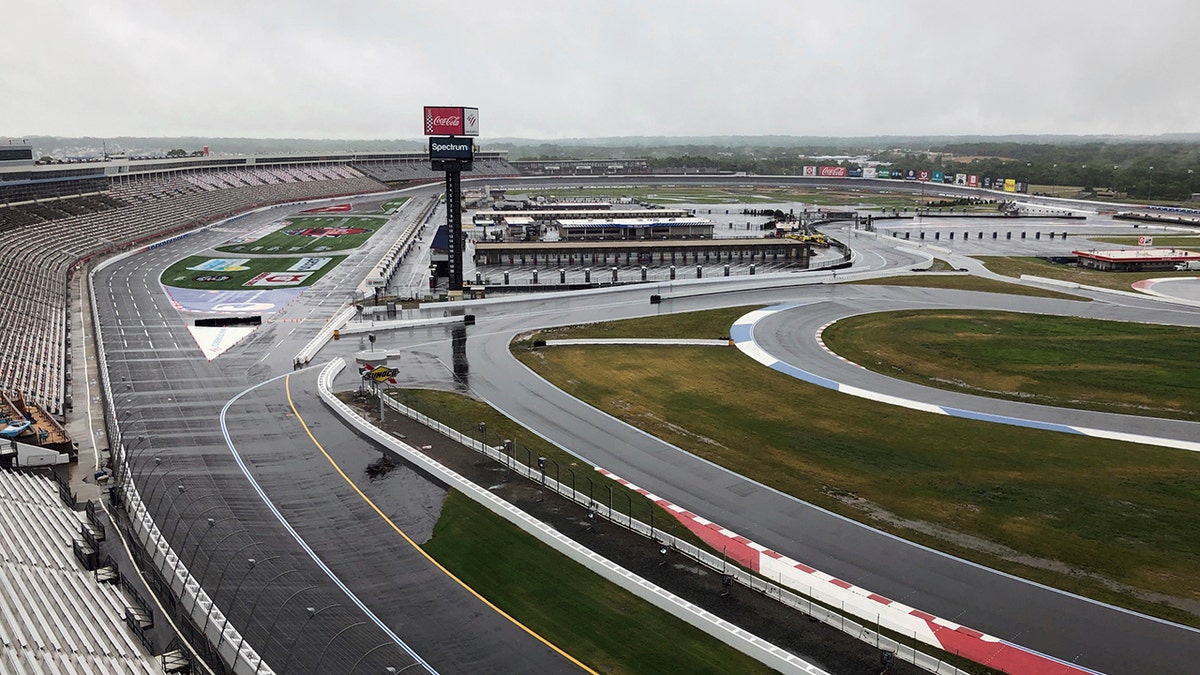 Charlotte Motor Speedway is shown in Concord, N.C., Wednesday, May 20, 2020. Some fans have been coming to the Coca-Cola 600 for decades, but they won’t be allowed into Charlotte Motor Speedwaý on Sunday due to Covid-19, leaving the grandstands empty and many disappointed. (AP Photo/Steve Reed)