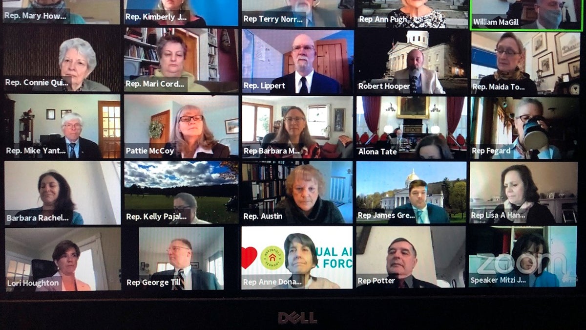 Members of the Vermont House of Representatives convene in a Zoom video conference for its first full parliamentary online session on Thursday, April 23, 2020, in Montpelier, Vt. (Wilson Ring/Zoom via AP)