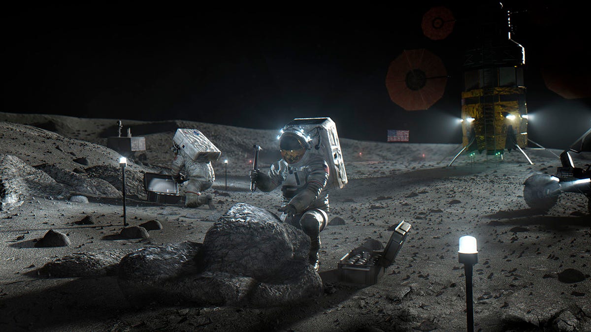 This illustration made available by NASA in April 2020 depicts Artemis astronauts on the Moon. On Thursday, April 30, 2020, NASA announced the three companies that will develop, build and fly lunar landers, with the goal of returning astronauts to the moon by 2024. (NASA via AP)