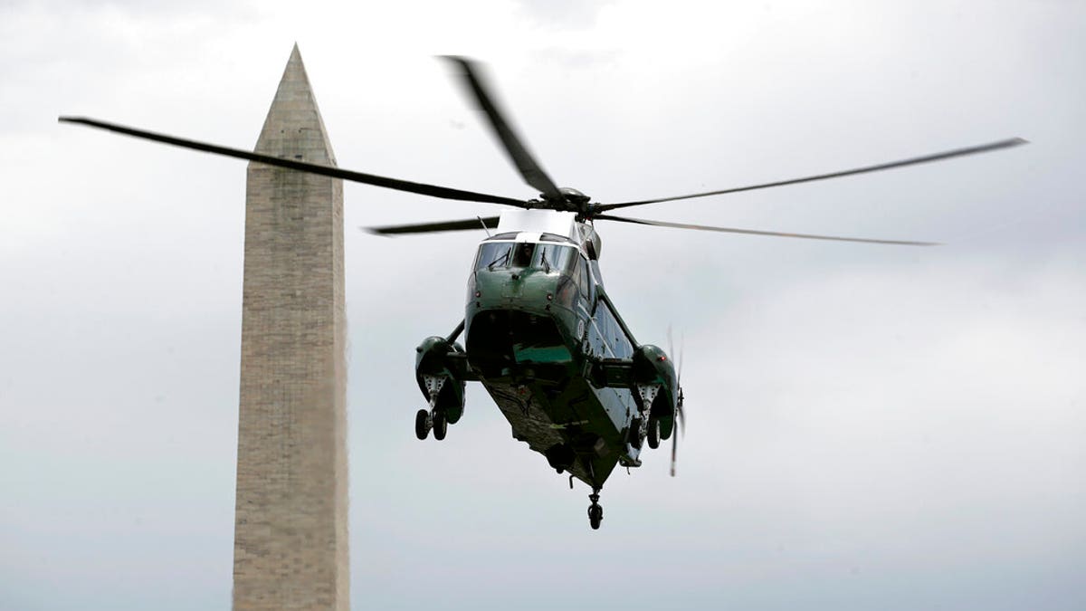Marine One, with President Donald Trump aboard, approaches the South Lawn of the White House, Sunday, May 3, 2020, in Washington. Trump is returning from a trip to Camp David, Md. (AP Photo/Patrick Semansky)