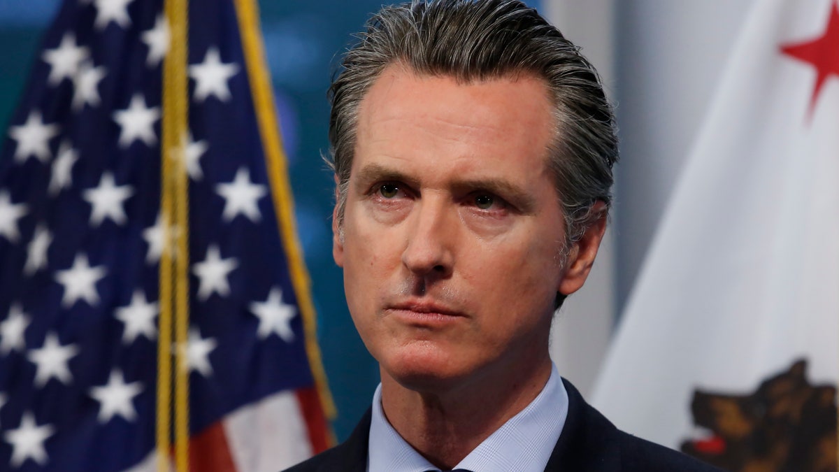 California Gov. Gavin Newsom listens to a reporter's question during his daily news briefing in Rancho Cordova, Calif on April 9. California is expected to be refunded $247 million it paid to a Chinese car company under a major, yet "murky" deal for protective masks, according to state officials on Wednesday.<br data-cke-eol="1">
(AP Photo/Rich Pedroncelli, Pool)