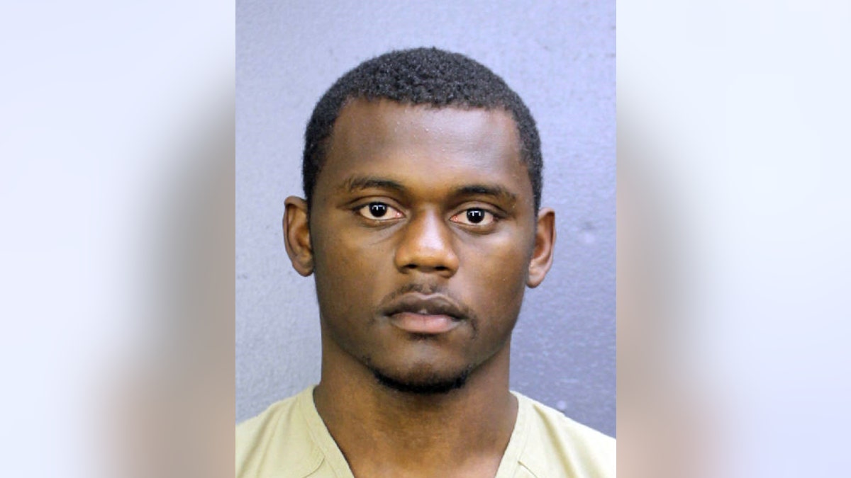 This booking photo provided by the Broward County, Fla., Sheriff's Office shows DeAndre Baker. Baker is charged with four counts of armed robbery with a firearm and four counts of aggravated assault with a firearm. He turned himself in at the Broward County Jail. (Broward County Sheriff's Office via AP)
