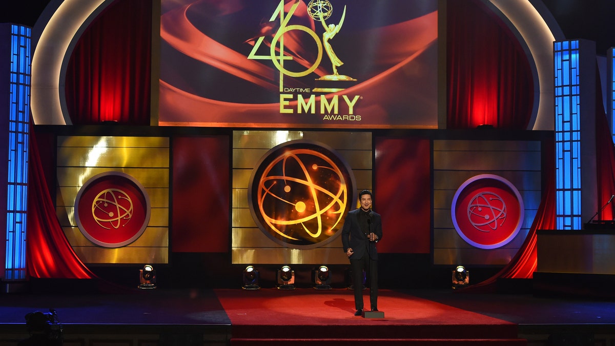 FILE - This May 5, 2019 file photo shows host Mario Lopez on stage at the 46th annual Daytime Emmy Awards in Pasadena, Calif. 
