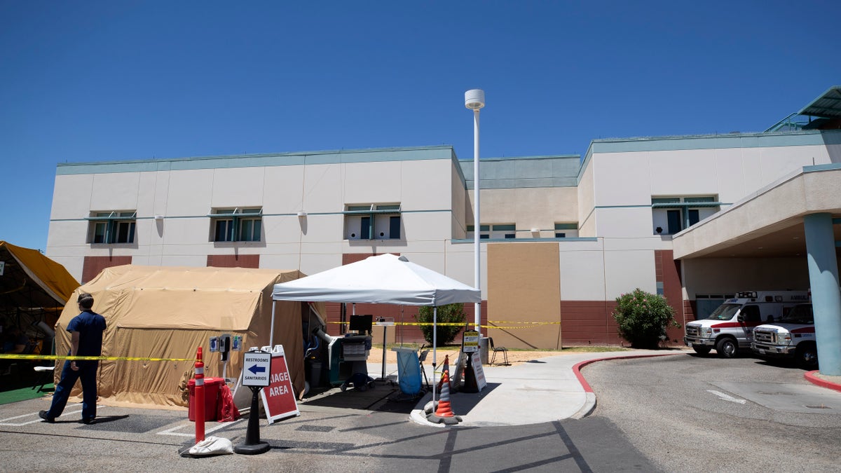 A tent in front of the El Centro Regional Medical Center in California, where staffers help process patients with symptoms related to the coronavirus.