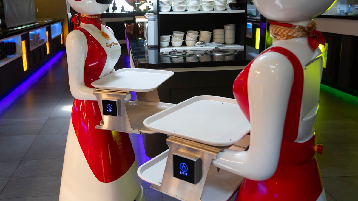 Robots at the Hu family's Royal Palace restaurant in Renesse. (AP Photo/Peter Dejong)