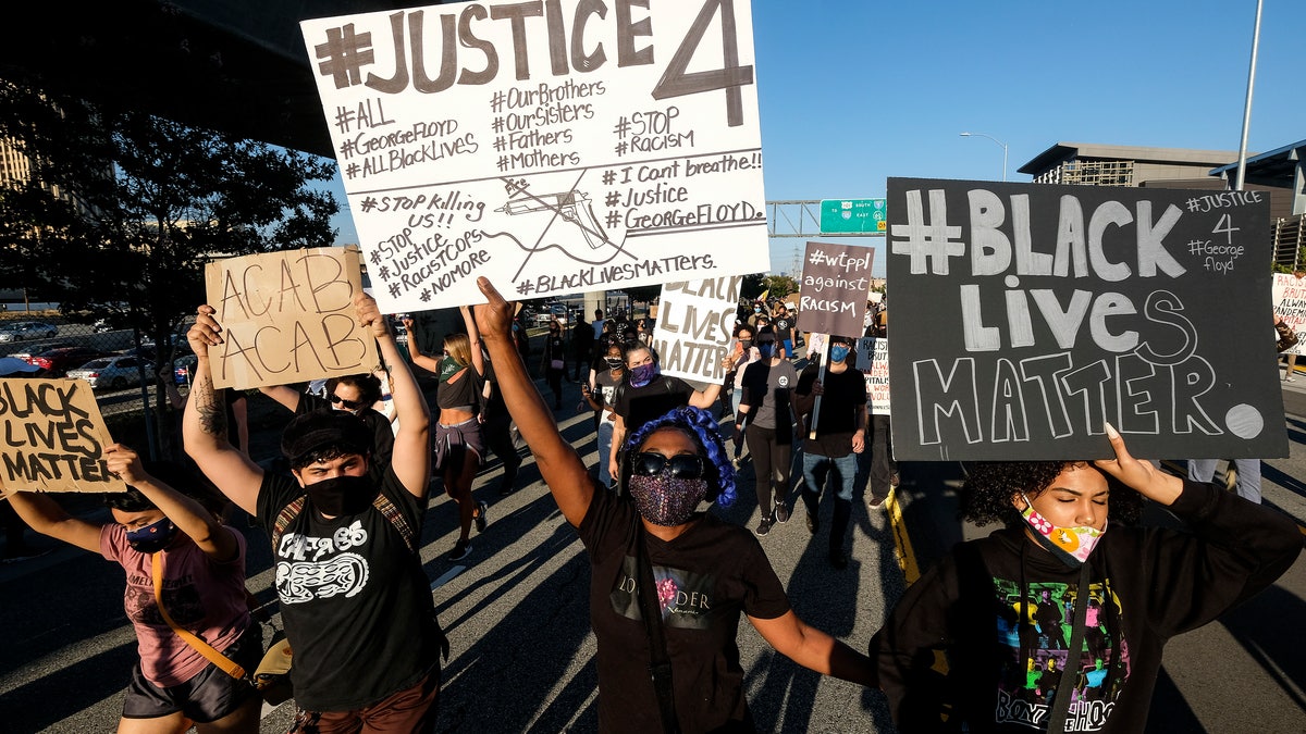 Demonstrators shut down the Hollywood Freeway in Los Angeles on Wednesday, May 27, 2020, during a protest about the death of George Floyd in police custody in Minneapolis earlier in the week. (Associated Press)