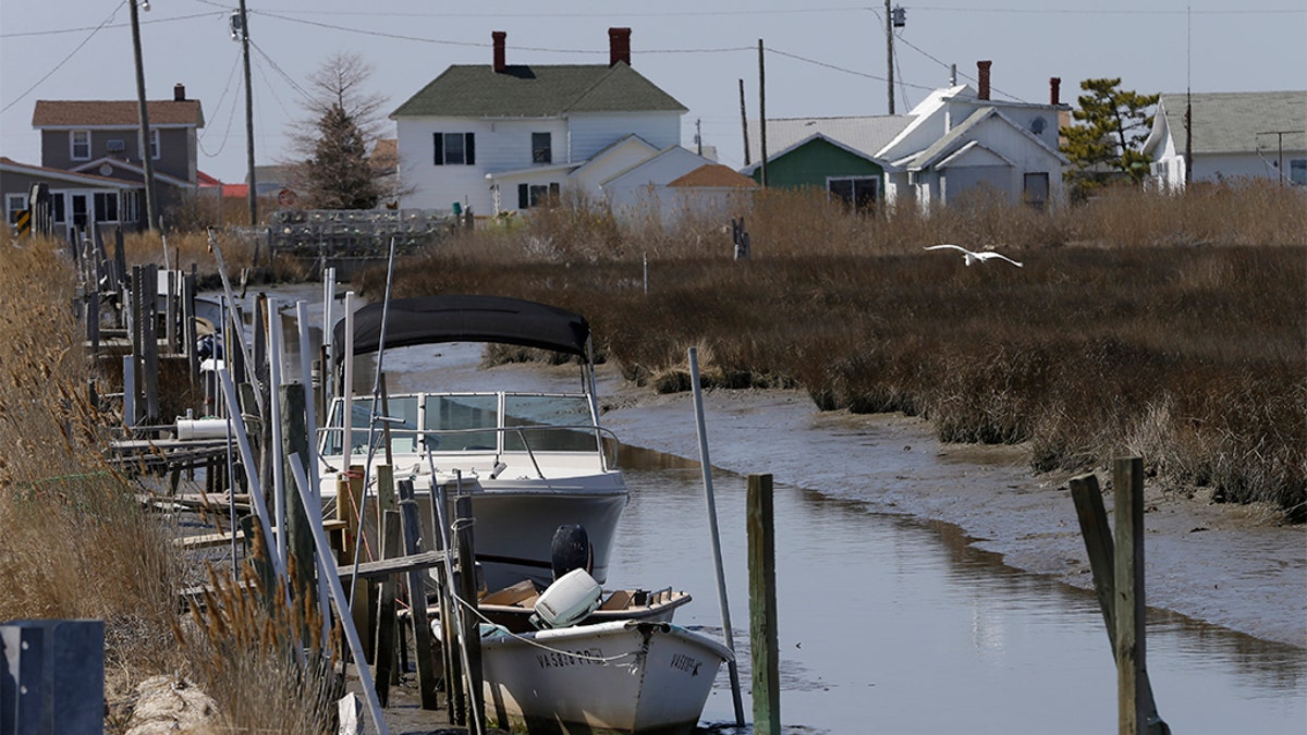 Boats on a Tangier Island creek in 2013. (AP Photo/Steve Helber, File)