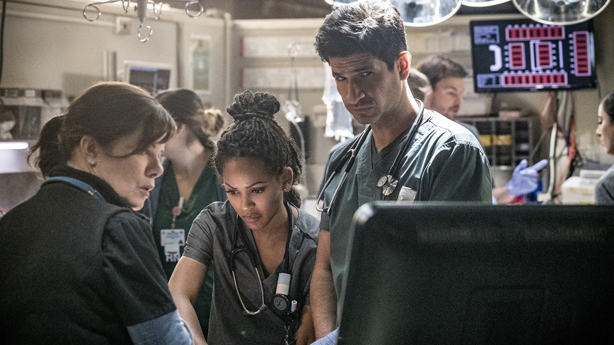 Marcia Gay Harden (Dr. Leanne Rorish), right, Meagan Good, center, (Grace Adams) and Raza Jaffrey (Dr. Neal Hudson) in 'Code Black.'<br>
​​