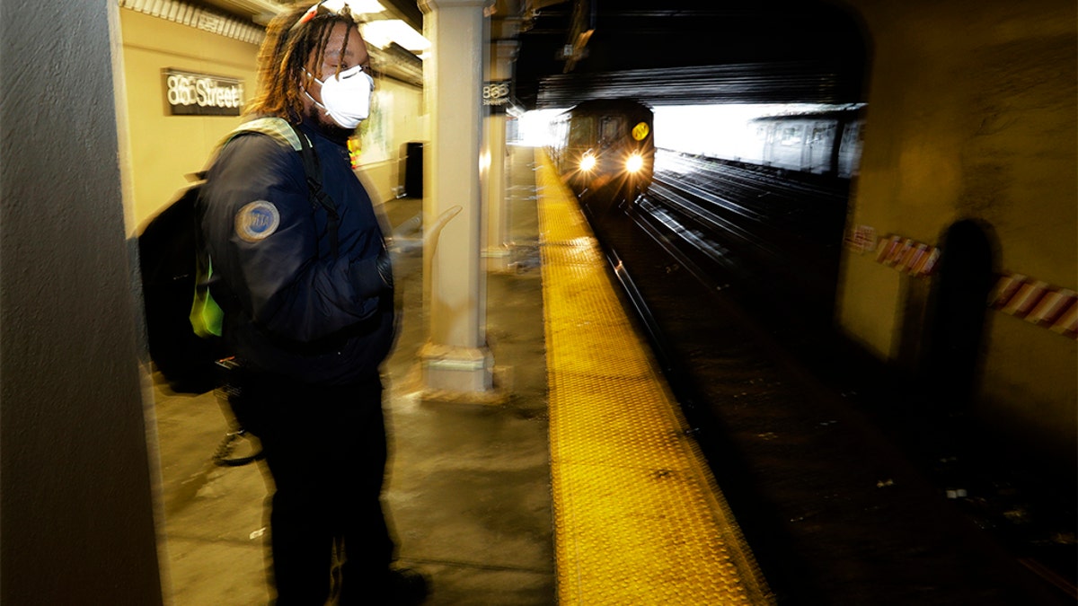 The subway conductor said he still felt a sense of purpose working during the coronavirus outbreak. (AP Photo/Frank Franklin II)