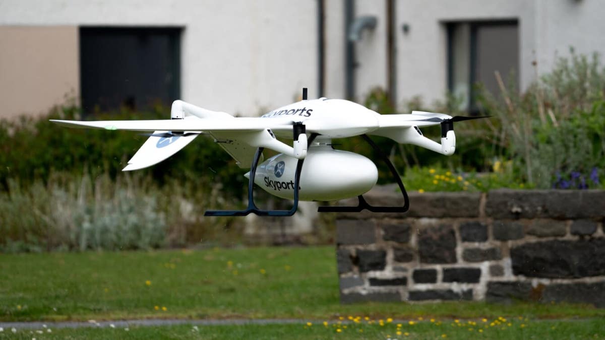 Skyports delivery drone manufactured by Wingcopter in-flight. Supplies are transported in the container beneath the drone - file photo.