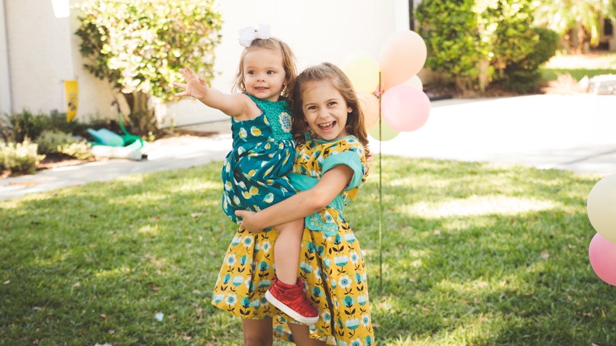 Isla Moody and one of her older sisters, pictured.