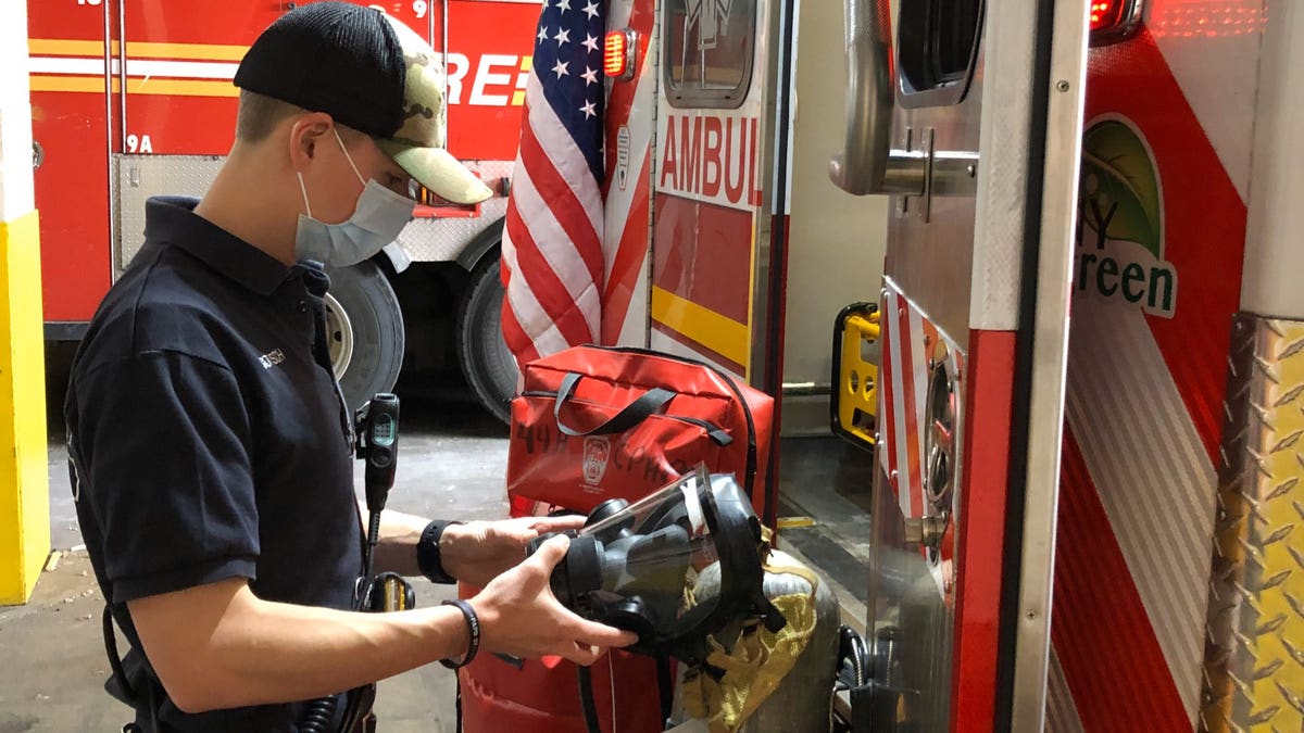 Paramedics don gowns, gloves, goggles and N95 masks before they enter a home. Six percent of the FDNY’s 4,400 EMS workers are currently on COVID 19 medical leave.