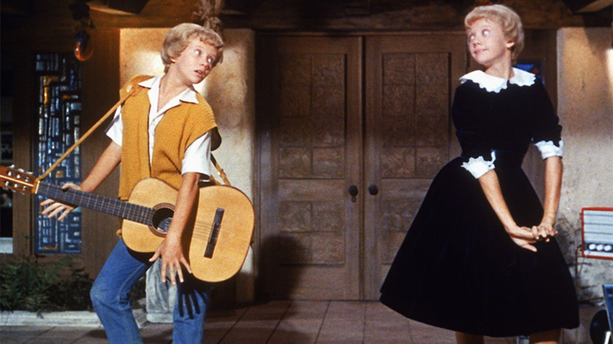 English actress Hayley Mills as identical twins Sharon McKendrick and Susan Evers in the Walt Disney comedy 'The Parent Trap', 1961.