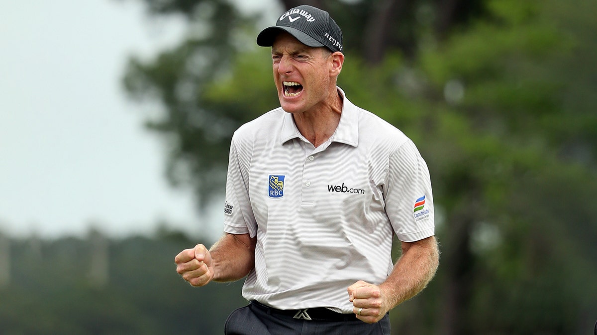 Jim Furyk makes a birdie putt on the second playoff hole against Kevin Kisner to win the RBC Heritage at Harbour Town Golf Links on April 19, 2015 in Hilton Head Island, S.C. (Photo by Streeter Lecka/Getty Images)