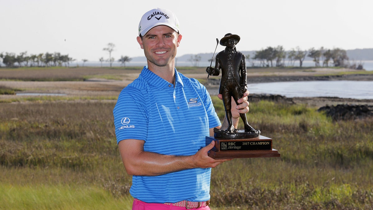Wesley Bryan celebrates with the trophy after winning the 2017 RBC Heritage at Harbour Town Golf Links during the final round on April 16, 2017 in Hilton Head Island, S.C. (Photo by Streeter Lecka/Getty Images)