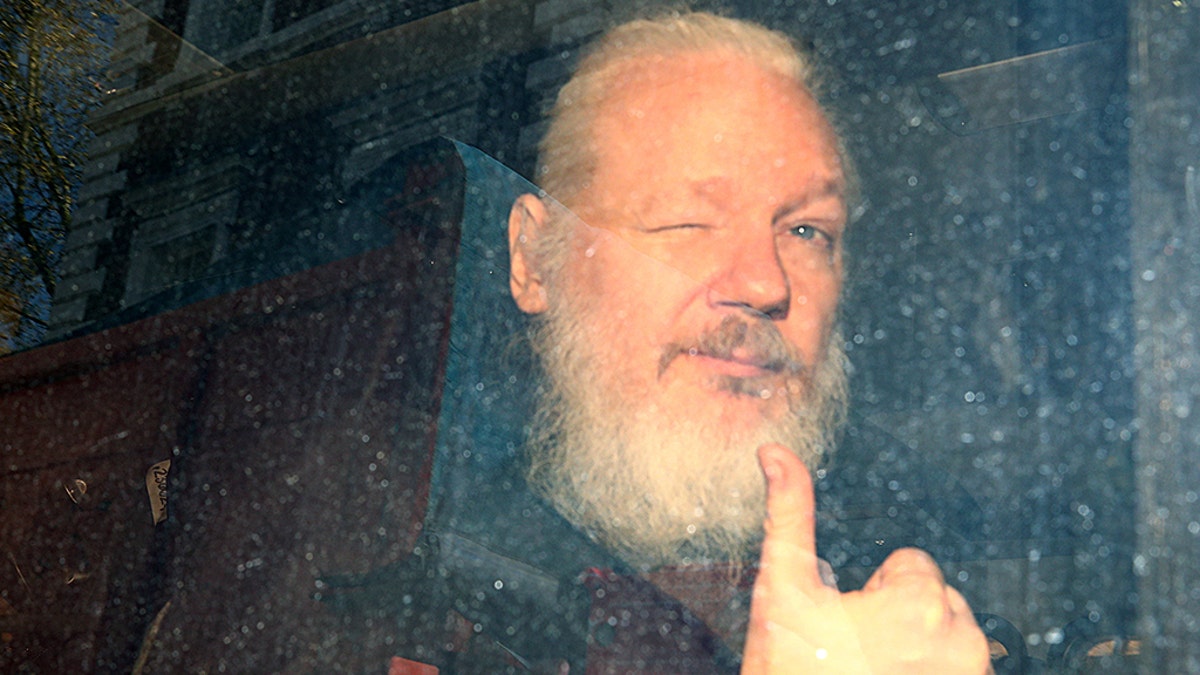 WikiLeaks founder Julian Assange arrives at the Westminster Magistrates Court, after he was arrested in London, Britain April 11, 2019.