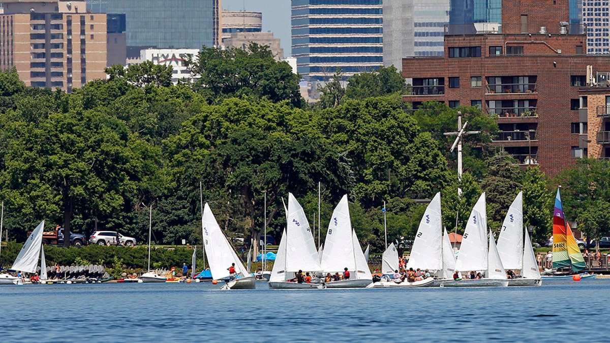 Sailors navigate a course on Lake Calhoun in Minneapolis, Minnesota July 3, 2013. (REUTERS/Eric Miller)