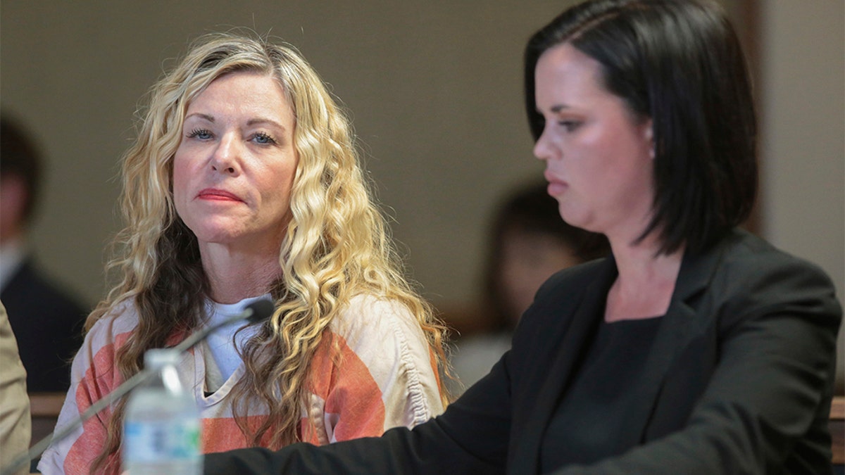 Lori Vallow, left, glances at the camera while seated next to her defense attorney, Edwina Elcox, during a hearing in Rexburg, Idaho, on March 6, 2020. An autopsy report released May 8, 2020, has revealed that a pulmonary blood clot killed the brother of Vallow, who is being detained on charges related to the disappearance of her two children.<br>
(John Roark/The Idaho Post-Register via AP, Pool, File)