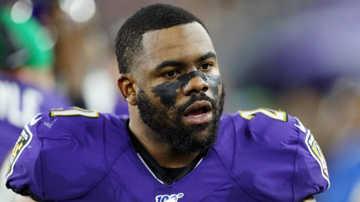 BALTIMORE, MARYLAND - JANUARY 11: Mark Ingram II #21 of the Baltimore Ravens reacts on the sideline during the first half in the AFC Divisional Playoff game against the Tennessee Titans at M&T Bank Stadium on January 11, 2020 in Baltimore, Maryland. (Photo by Maddie Meyer/Getty Images)
